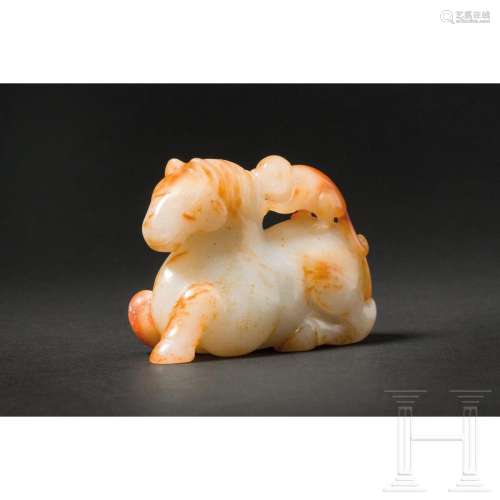 A Chinese recumbent jade horse with monkey, 20th century
