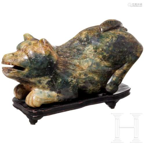A large Chinese serpentin carving of a cat, 20th century