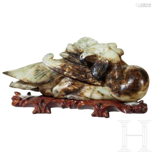 A Chinese reclining phoenix figure made of jade, 20th centur...