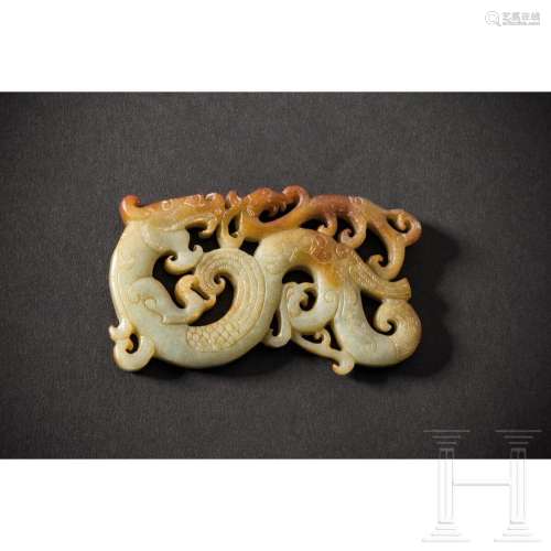 A Chinese jade pendant with dragon and phoenix design, 20th ...