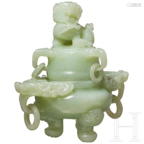 A Chinese lidded vessel in light green jade, late 19th/early...