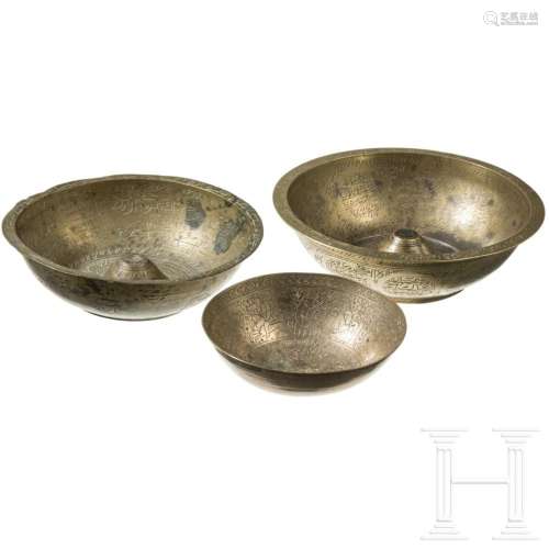 Three Persian brass bowls, circa 1900