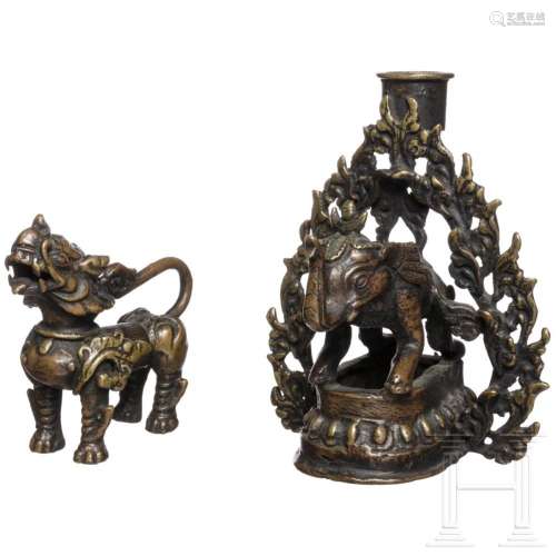 A Thai bronze candlestick and animal figurine, 1st half of t...