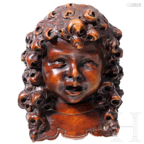 A German boxwood angel's head, 17th/18th century