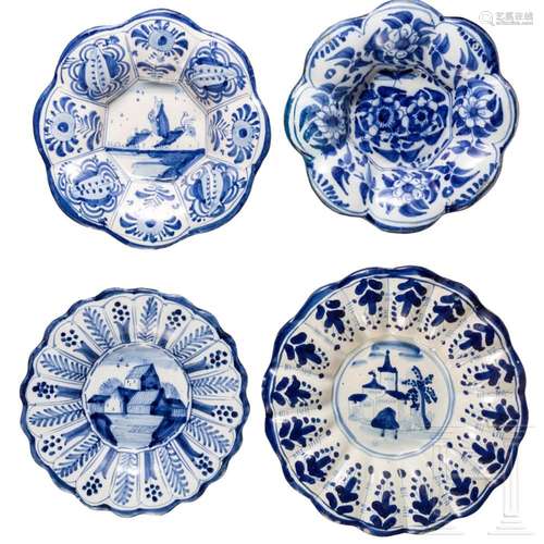 Four German blue and white "Buckelteller" plates, ...