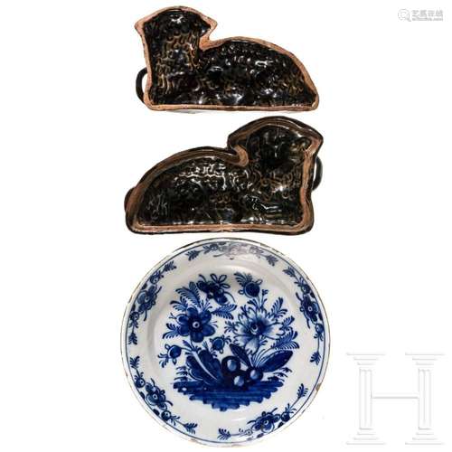 A lamb-shaped pottery backing dish and a faience plate, 19th...