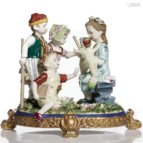 A German porcelain figure group of children playing with dol...