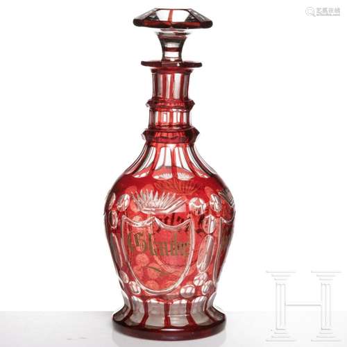 A large Bohemian ruby-red glazed glass decanter with stopper...