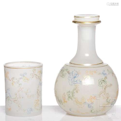 A Bohemian alabaster glass decanter with stopper and beaker,...