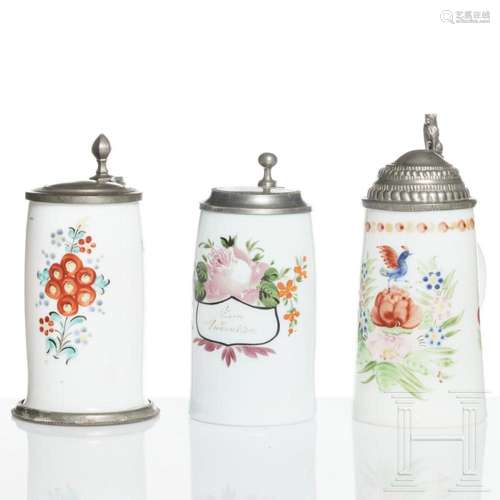 Three German or Bohemian pewter-mounted milk glass jugs, cir...