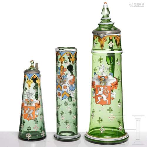 Three North Bohemian green glass jugs with enamel painting, ...