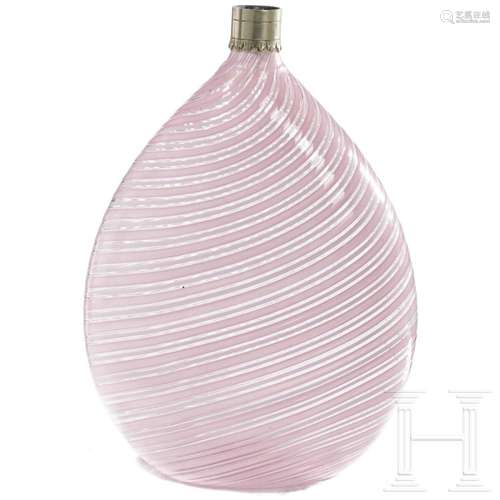 An Italian glass bottle with white and pink threads, Murano,...