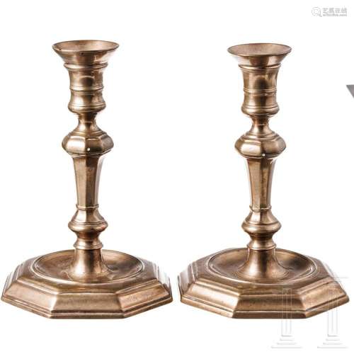 A pair of German bronze candlesticks, circa 1750