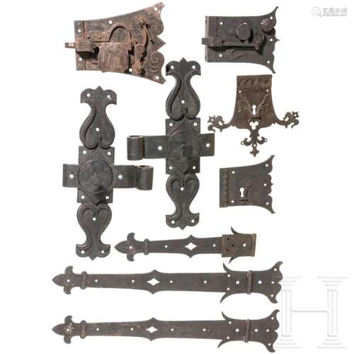 Seven German iron chest plaques and two locks, 19th century