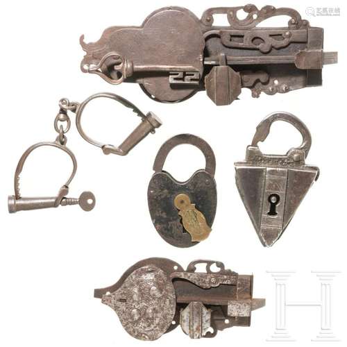 Two German iron door locks, two shackle locks and one handcu...