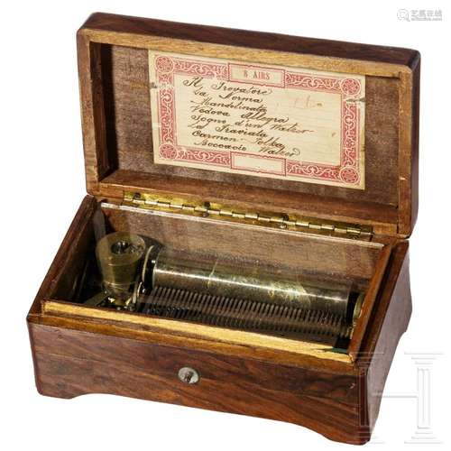 A Swiss barrel music box with eight melodies, circa 1900