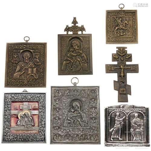 Six brass icons and a silver relief showing the Annunciation...