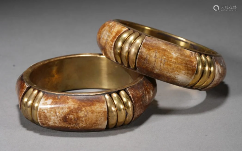 Pair of Antique Tibetan Bone Inlaid Gilt Copper Bangles