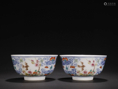 A Pair of Fine Doucai 'Flowers and Birds' Bowls