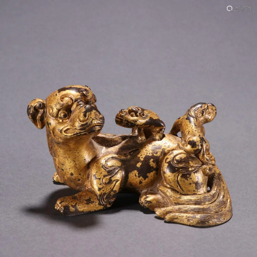 A Delicate Gilt-bronze Beast Ornament