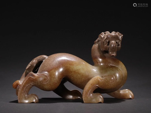 A Finely Carved Jade Chi-Dragon Ornament