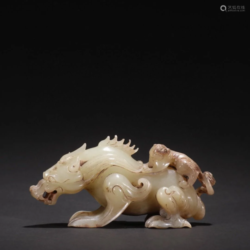 A Rare Carved Jade Beast Ornament