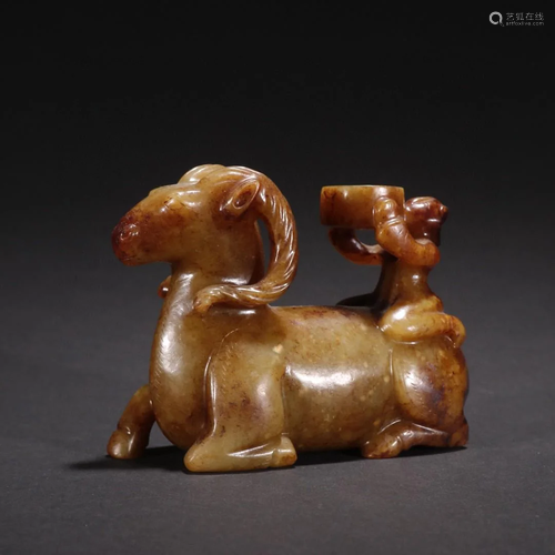 A Finely Carved Jade Ram Group