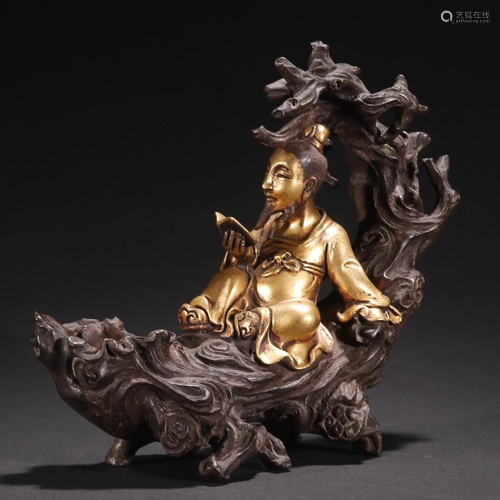 A Finely Carved Gilt-bronze Figure Ornament