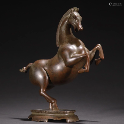 A Finely Carved Copper Horse Ornament