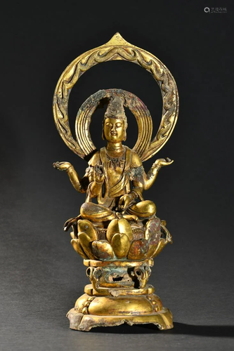 A Fine Gilt-bronze Four-armed Statue of Guanyin