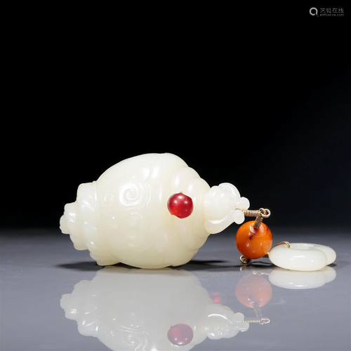 A Marvelous White Jade Conch-Form Pendant