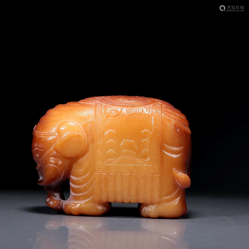 An Exquisite Yellow Jade Elephant