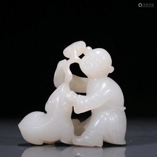 An Exquisite White Jade Figure