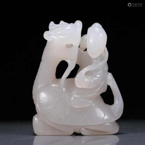 An Exquisite White Jade Figure