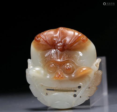 An Exquisite White Jade 'Animal Mask' Belt-Buckle
