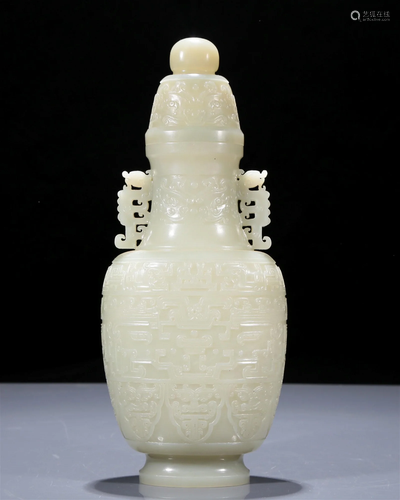 A Superb White Jade 'Animal Mask' Dragon-Handled Vase And Co...