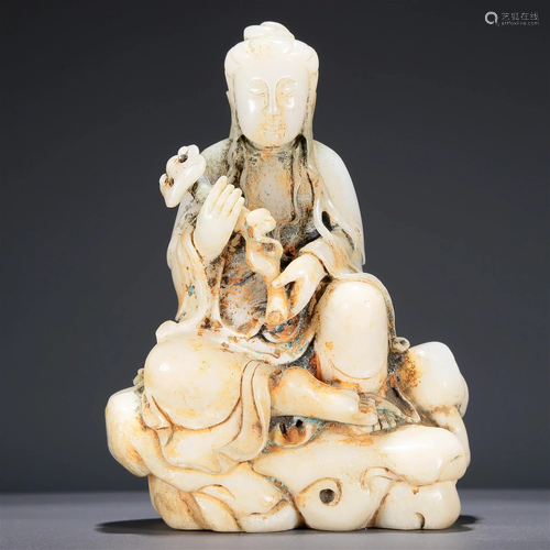 A Brilliant White Jade Figure Of Guanyin