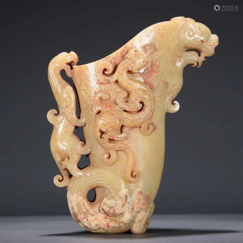 A Fabulous Celadon-White Jade 'Chi-Dragon' Cup