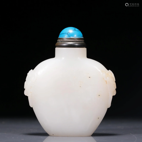 A Brilliant White Jade Beast-Handled Snuff Bottle