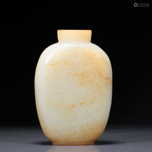 A Brilliant White Jade 'Chi-Dragon' Snuff Bottle