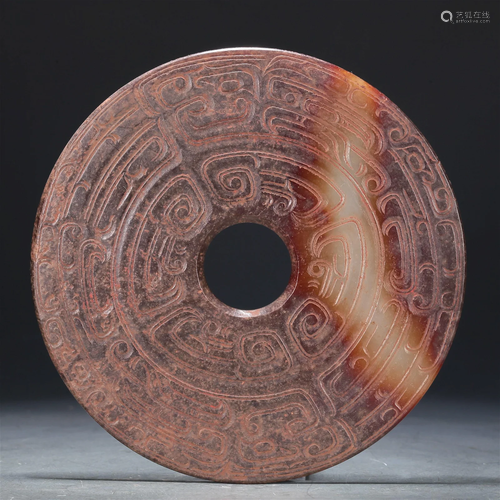 A Superb White Jade Bi-Disc