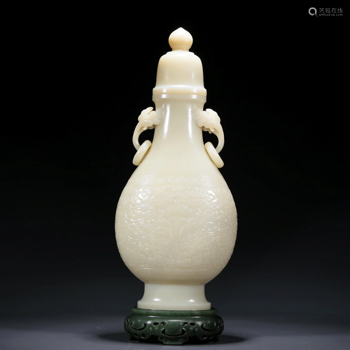 A Wonderful White Jade 'Auspicious Cloud' Vase With A Jasper...