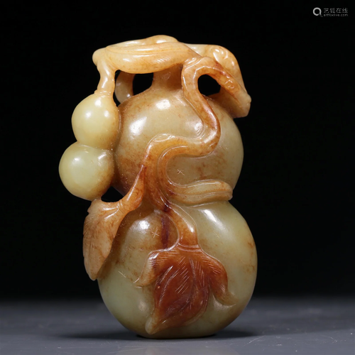 A Fine Celadon-White Jade 'Gourd' Pendant