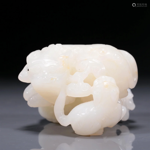 A Fine White Jade Lion Group