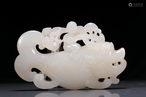 A Precious White Jade 'Auspicious Beast' Decoration