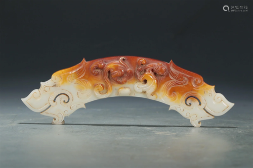 An Archaic White Jade 'Dragon' Ritual Item,  Huang