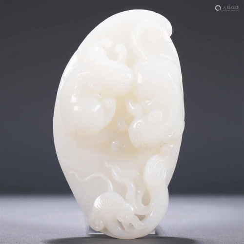 A Superb White Jade 'Chi-Dragon' Pendant