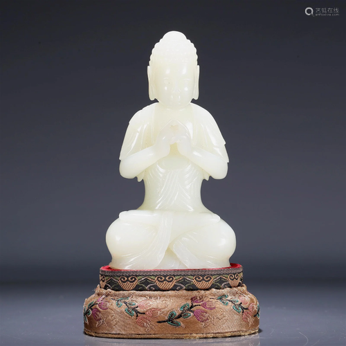 A Wonderful White Jade Figure Of Buddha Shakyamuni