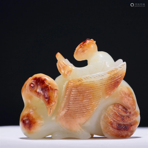 A Fabulous Gaogu White Jade 'Auspicious Beast' Decoration