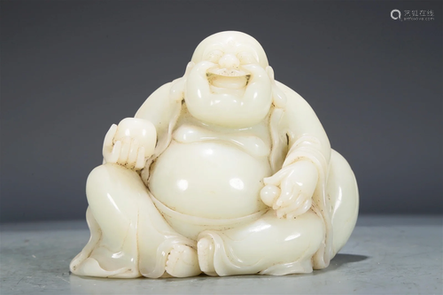 A Fabulous White Jade Figure Of Maitreya